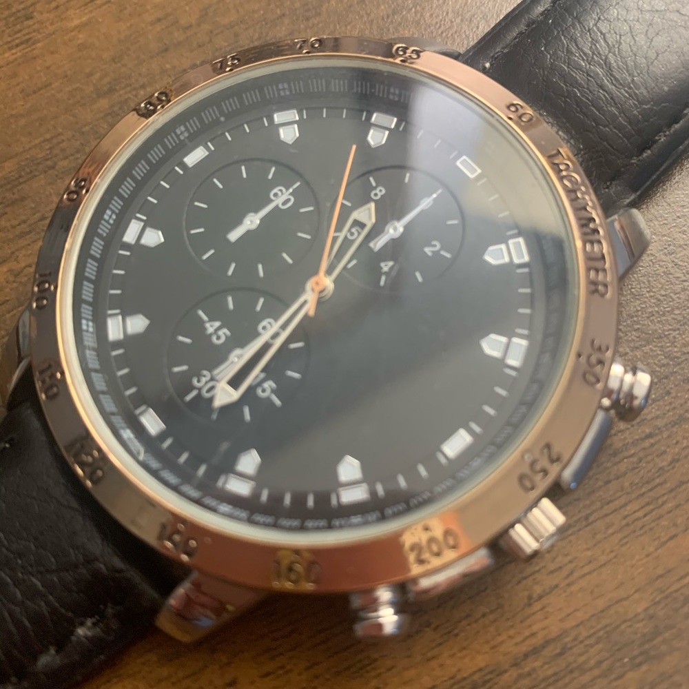 Large face, light weight watch with black strap